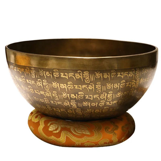 exterieur du bol tibetain ohm avec le mantra ohm peint en integralité