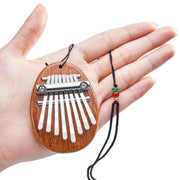 petite kalimba bois et son cordon